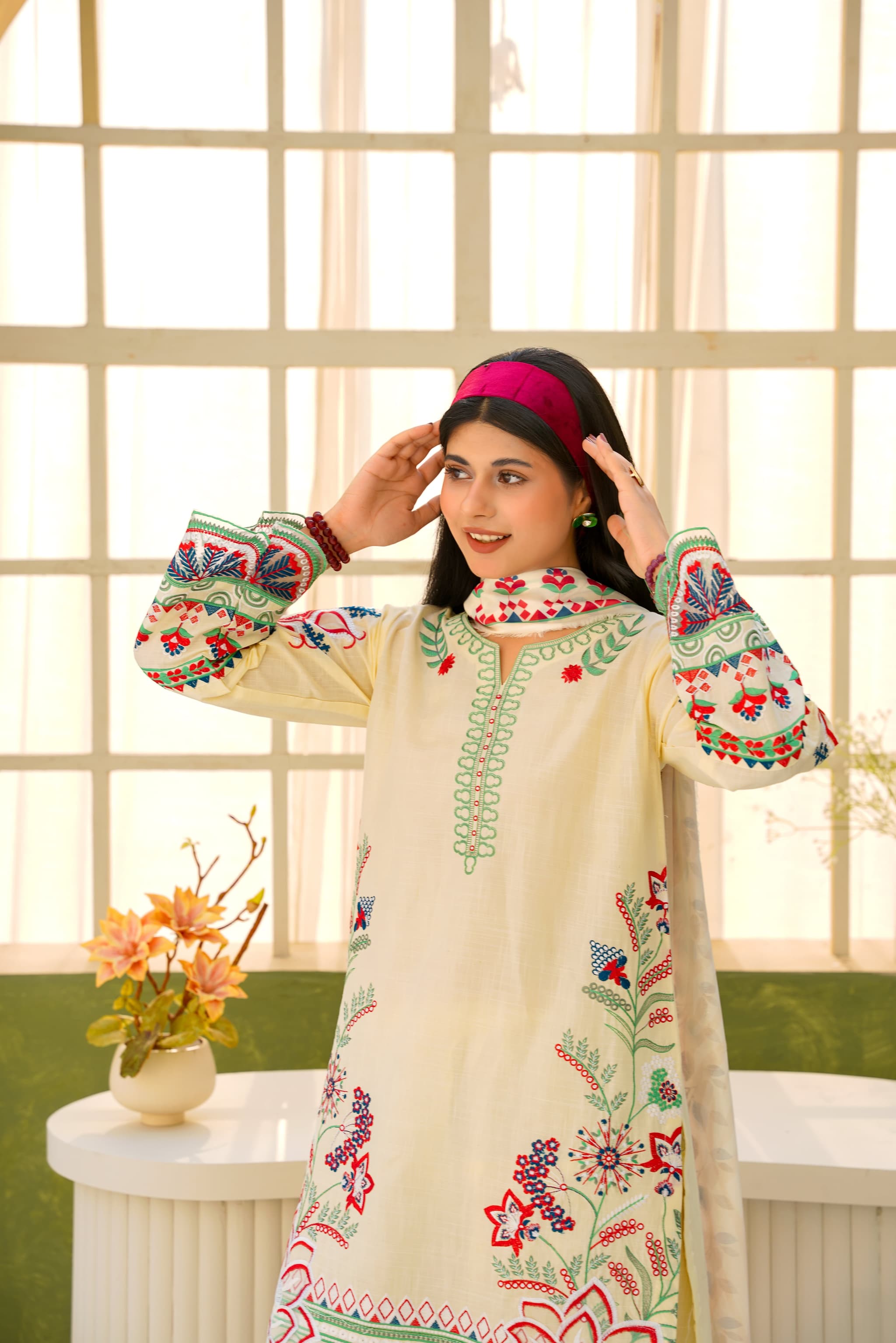 Memonaas — Where Modesty Meets Modern Elegance, model wearing an embroidered suit from the collection